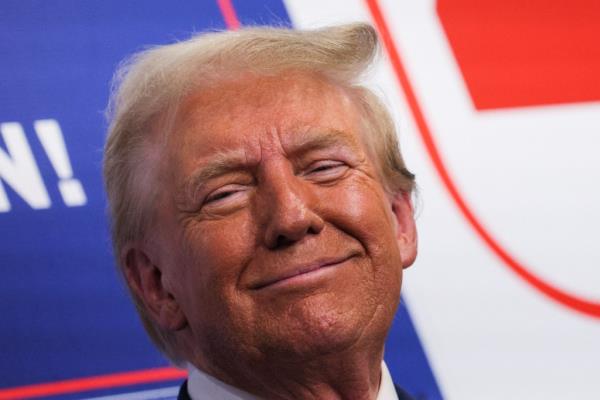 Republican presidential nominee and former U.S. President Do<em></em>nald Trump looks on as he visits a campaign office in Hamtramck, Michigan, U.S. October 18, 2024.